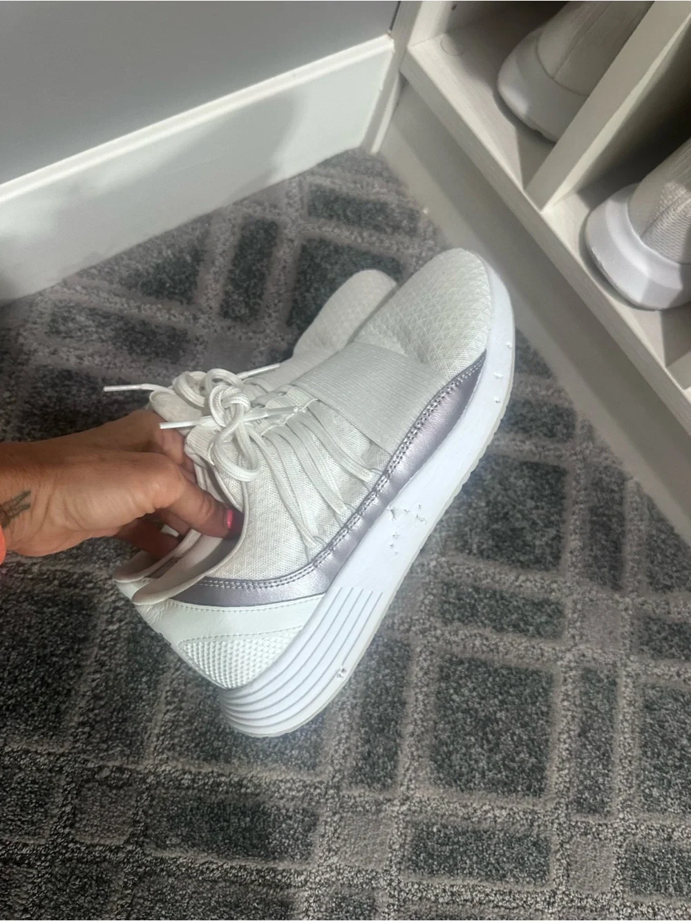Under Armour Women’s White Athletic Lace-Up Slip-On Sneaker with Silver Accent